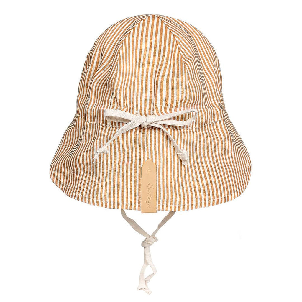 Striped bucket hat with a bow on a white background