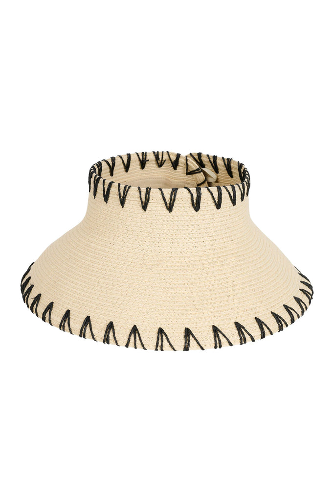 Beige lampshade with black zigzag trim on a white background