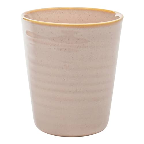 Pink ceramic cup with gold rim on a white background