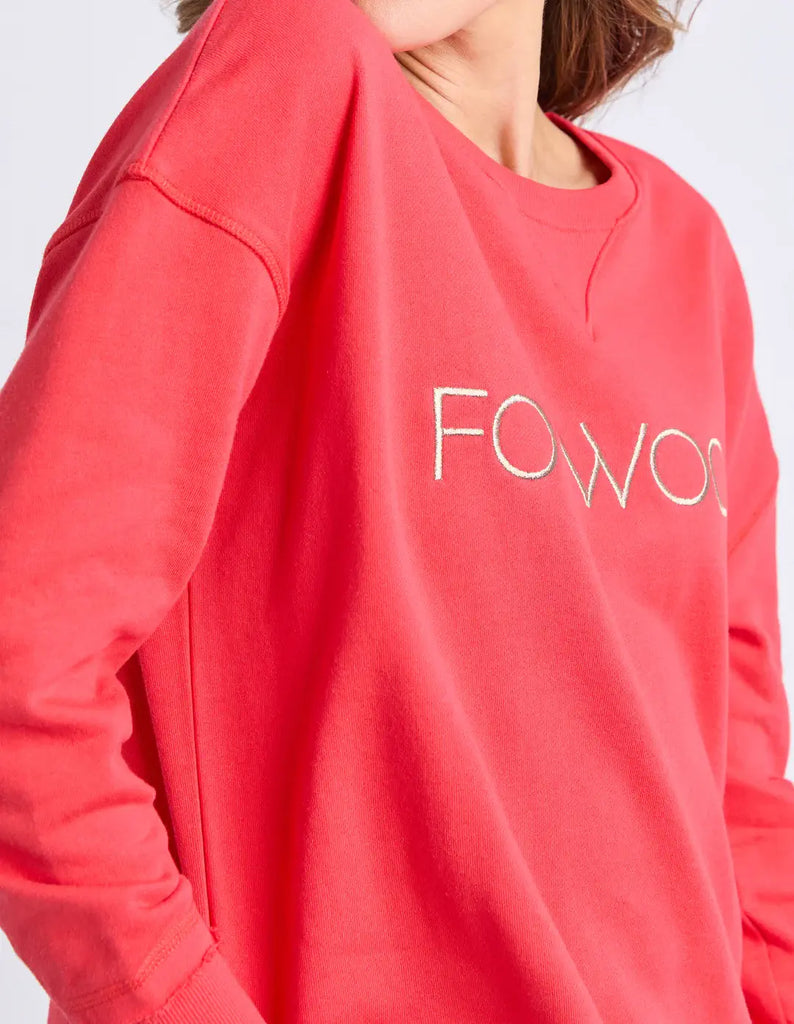 Red sweatshirt with 'FOWO' text on a plain background