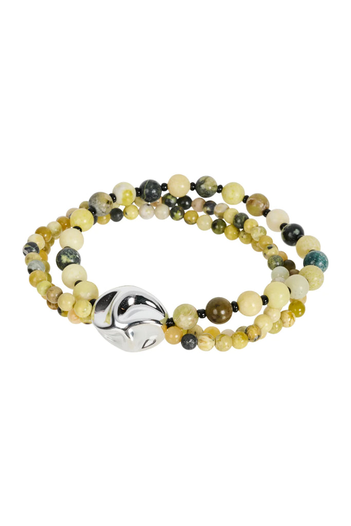 Multicolored beaded bracelet with a silver clasp on a white background