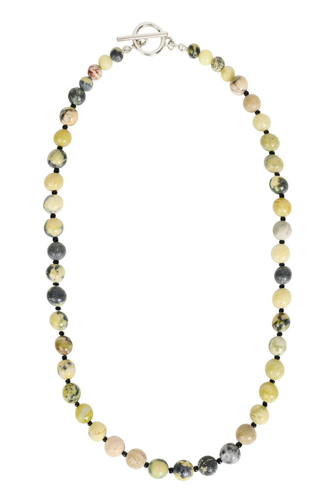 Necklace with multicolored beads on a white background