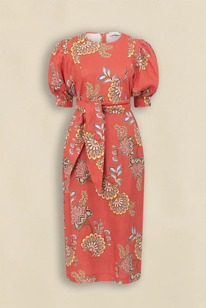 Red floral dress on a beige background