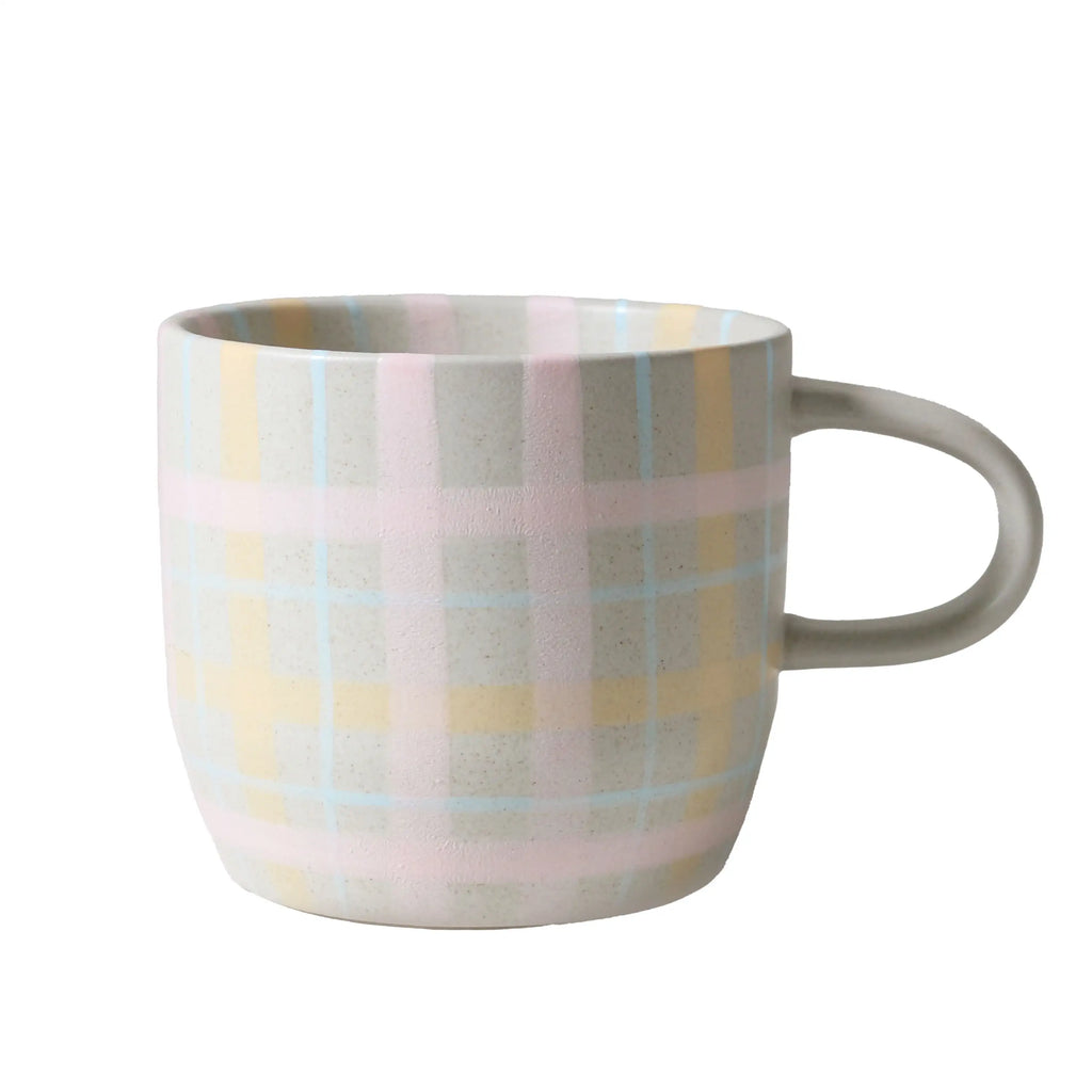 Mug with pastel plaid pattern on a white background