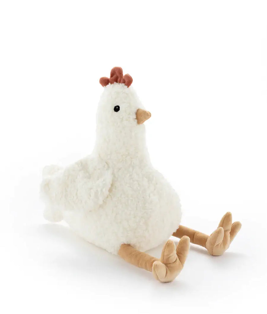 Plush toy chicken on a white background